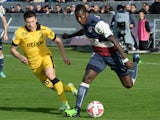Bordeaux' Abdou Traore vies with Lille's Jonathan Delaplace during the French L1 football match Girondins de Bordeaux vs LOSC Lille on November 30, 2014