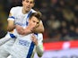 Dnipropetrovsk's midfielder Ruslan Rotan celebrates after scoring a goal with Dnipropetrovsk's forward from Croatia Nikola Kalinic during the UEFA Europa League football match Inter Milan vs Dnipro on November 27, 2014