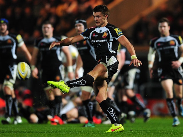 Henry Slade of Exeter Chiefs puts in a kick during the Aviva Premiership match between Exeter Chiefs and Saracens at Sandy Park on November 29, 2014