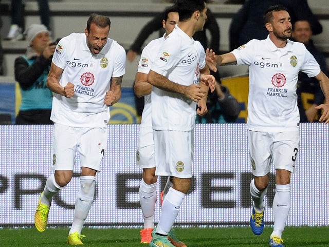 Vangelis Moras #18 of Hellas Verona FC celebrates after scroing the opening goal during the Serie A match between US Sassuolo Calcio and Hellas Verona FC on November 29, 2014