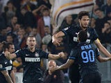 Inter Milan's defender Andrea Ranocchia celebrates after scoring against AS Roma during the Italian Serie A football match between AS Roma and Inter Milan at the Olympic stadium on November 30, 2014
