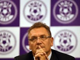 Jerome Valcke gestures during a joint press conference with Indian parliamentarian and president of the All India Football Federation, Praful Patel in New Delhi on October 15, 2014