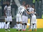 Juventus' midfielder Andrea Pirlo celebrates with teammates after scoring during the Italian Serie A football match Juventus Vs Torino on November 30, 2014