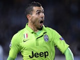 Juventus' forward Carlos Tevez celebrates after scoring a goal during the UEFA Champions League group A football match Malmo FF vs Juventus at the Swedbank Stadion in Malmo, Sweden on November 26, 2014