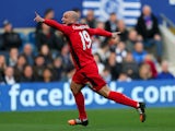 Esteban Cambiasso of Leicester City celebrates after scoring the opening goal during the Barclays Premier League match between Queens Park Rangers and Leicester City at Loftus Road on November 29, 2014