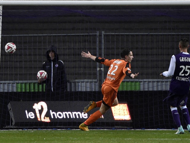 Lorient's French forward Benjamin Jeannot celebrates after scoring a goal during the French L1 football match Toulouse vs Lorient on November 29, 2014