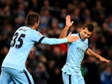 Sergio Aguero of Manchester City celebrates with teammate Stevan Jovetic #35 of Manchester City after scoring his team's second goal during the UEFA Champions League Group E match between Manchester City and FC Bayern Muenchen at the Etihad Stadium on Nov