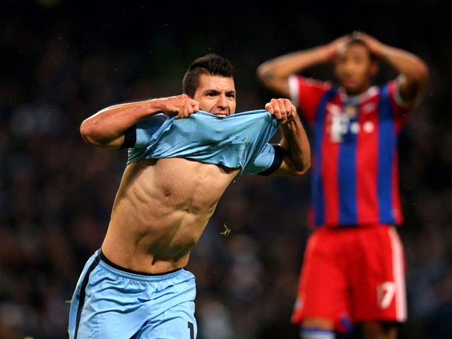 Sergio Aguero of Manchester City celebrates after scoring his team's third and matchwinning goal during the UEFA Champions League Group E match between Manchester City and FC Bayern Muenchen at the Etihad Stadium on November 25, 2014
