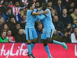 Yaya Toure of Manchester City (R) celebrates with team mate Sergio Aguero as he scores their first goal during the Barclays Premier League match between Southampton and Manchester City at St Mary's Stadium on November 30, 2014