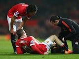 Wayne Rooney of Manchester United receives treatment during the Barclays Premier League match between Manchester United and Hull City at Old Trafford on November 29, 2014