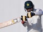 Pakistani batsman Mohammad Hafeez plays a shot during the first day of the third and final Test match between Pakistan and New Zealand at the Sharjah cricket stadium in Sharjah on November 26, 2014