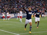 Charlie Davies #9 of the New England Revolution celebrates his goal in the first half against New York Red Bulls during Leg 2 of the MLS Eastern Conference Final at Gillette Stadium on November 29, 2014
