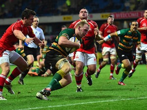 Saints player Ben Nutley crosses for a Saints try during the Aviva Premiership match between London Welsh and Northampton Saints at Kassam Stadium on November 30, 2014