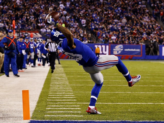 Odell Beckham #13 of the New York Giants scores a touchdown in the second quarter against the Dallas Cowboys at MetLife Stadium on November 23, 2014