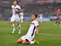 Paulo Dybala of Palermo celebrates after scoring the opening goal during the Serie A match between Genoa CFC and US Citta di Palermo at Stadio Luigi Ferraris on November 24, 2014 