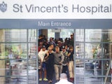 David Warner exits St Vincent's Hospital following the death of Phil Hughes on November 27, 2014