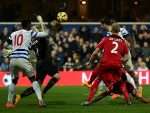 Charlie Austin of QPR scores his team's third goal during the Barclays Premier League match between Queens Park Rangers and Leicester City at Loftus Road on November 29, 2014