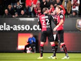 Rennes' Swedish forward Ola Toivonen celebrates with Rennes' French defender Sylvain Armand after scoring a goal during the French L1 football match Rennes against Monaco on November 29, 2014
