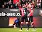 Rennes' Swedish forward Ola Toivonen celebrates with Rennes' French defender Sylvain Armand after scoring a goal during the French L1 football match Rennes against Monaco on November 29, 2014