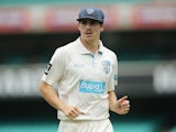 Sean Abbott of New South Wales looks on during day one of the Sheffield Shield match between New South Wales and South Australia at Sydney Cricket Ground on November 25, 2014