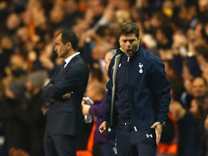 Manager Mauricio Pochettino of Spurs reacts after Roberto Soldado of Spurs scores their second goal during the Barclays Premier League match between Tottenham Hotspur and Everton at White Hart Lane on November 30, 2014