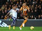 Ahmed Elmohamady of Hull City is challenged by Stephane Sessegnon of West Brom during the Barclays Premier League match on December 6, 2014