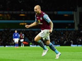Alan Hutton of Villa celebrates after scoring the second goal during the Barclays Premier League match between Aston Villa and Leicester City at Villa Park on December 7, 2014