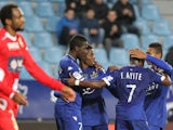 Bastia players celebrate after scoring a goal during the French L1 football match between Bastia and Evian on December 3, 2014
