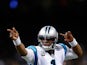 Cam Newton #1 of the Carolina Panthers celebrates after scoring a touchdown in the first half against the New Orleans Saints at Mercedes-Benz Superdome on December 7, 2014 