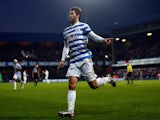 Charlie Austin of QPR celebrates scoring his team's second goal during the Barclays Premier League match against Burnley on December 6, 2014