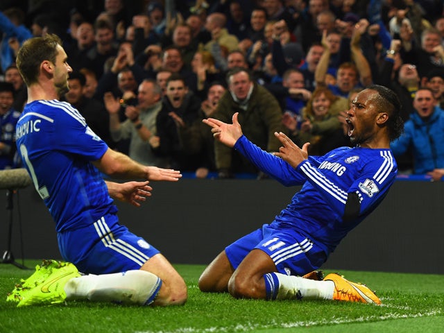 Didier Drogba of Chelsea celebrates scoring their second goal with Branislav Ivanovic of Chelsea during the Barclays Premier League match between Chelsea and Tottenham Hotspur at Stamford Bridge on December 3, 2014