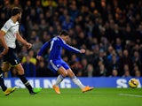 Eden Hazard of Chelsea scores the opening goal during the Barclays Premier League match between Chelsea and Tottenham Hotspur at Stamford Bridge on December 3, 2014
