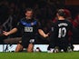 Darron Gibson of Manchester United celebrates with team mate Wayne Rooney (10) as he scores their second goal during the Barclays Premier League match against West Ham on December 5, 2014
