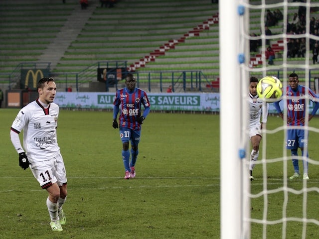 Nice's French midfielder Eric Bautheac scores a goal during the French L1 football match against Caen on December 6, 2014