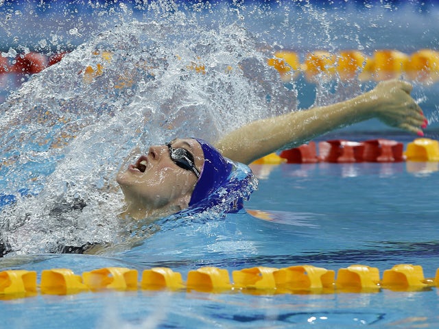 Georgia Davies of Great Britain competes in the women's 50m backstroke final during the FINA Swimming World Cup at the Singapore Sports Hub OCBC Aquatic Center on November 1, 2014