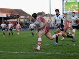 Stevie McColl of Gloucester Rugby runs in to score a try during the European Rugby Challenge Cup match between Gloucester Rugby and Zebre at Kingsholm Stadium on December 7, 2014 