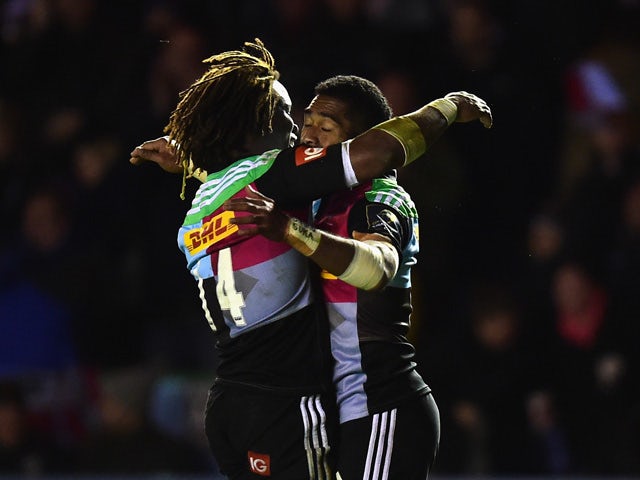 Aseli Tikoirotuma of Harlequins scores acelebrates his try during the European Rugby Champions Cup group 2 match between Harlequins and Leinster at Twickenham Stoop on December 7, 2014
