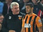 New Hull City signing Hatem Ben Arfa gets some advice from manager Steve Bruce before coming on for his debut on September 15, 2014