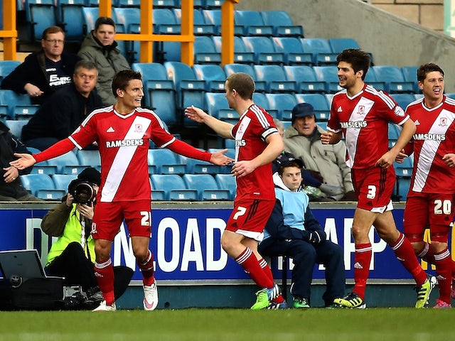 Middlesbrough celebrate with Jelle Vossen after he scores to make it 1-0 during the Sky Bet Championship match against Millwall on December 6, 2014