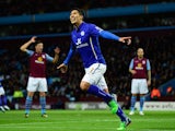 Leonardo Ulloa of Leicester celebrates after scoring the first goal during the Barclays Premier League match between Aston Villa and Leicester City at Villa Park on December 7, 2014