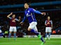 Leonardo Ulloa of Leicester celebrates after scoring the first goal during the Barclays Premier League match between Aston Villa and Leicester City at Villa Park on December 7, 2014