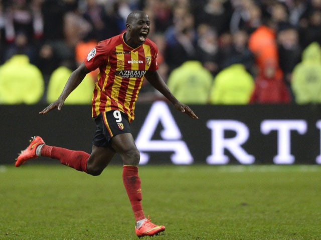 Lens' French forward Adamo Coulibaly celebrates after scoring a goal during the French L1 football match between Lens and Lille at the Stade de France in Saint-Denis, north of Paris, on December 7, 2014