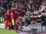 Liverpool's Peter Crouch celebrates after soring his first goal against Wigan during their Premiership match at Anfield, in Liverpool, 03 December 2005