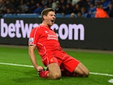  Steven Gerrard of Liverpool celebrates after scoring his team's second goal during the Barclays Premier League match between Leicester City and Liverpool at The King Power Stadium on December 2, 2014