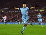  Sergio Aguero of Manchester City celebrates after scoring during the Barclays Premier League match between Sunderland and Manchester City at Stadium of Light on December 3, 2014