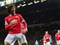 Manchester United's Belgian midfielder Marouane Fellaini celebrates after scoring the opening goal of the English Premier League football match between Manchester United and Stoke City at Old Trafford in Manchester, north west England, on December 2, 2014