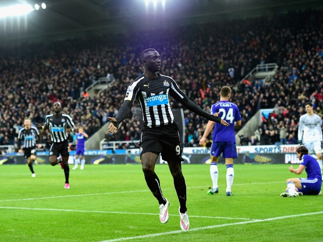 Papiss Cisse of Newcastle celebrates after scoring the second goal during the Barclays Premier League match between Newcastle United and Chelsea at St James' Park on December 6, 2014