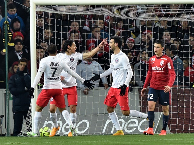 Paris Saint-Germain's Uruguayan forward Edinson Cavani celebrates after scoring a goal during their French L1 football match Lille vs PSG on December 3, 2014