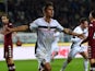 Paulo Dybala of Palermo celebrates after scoring his team's second goal during the Serie A match against Torino on December 6, 2014