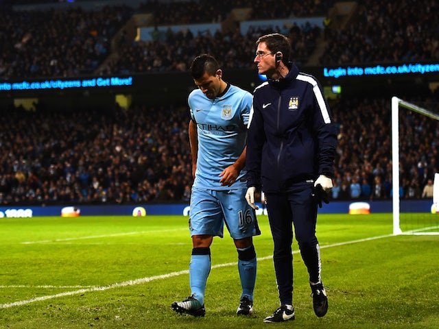 Sergio Aguero of Manchester City leaves the field injured during the Barclays Premier League match against Everton on December 6, 2014
